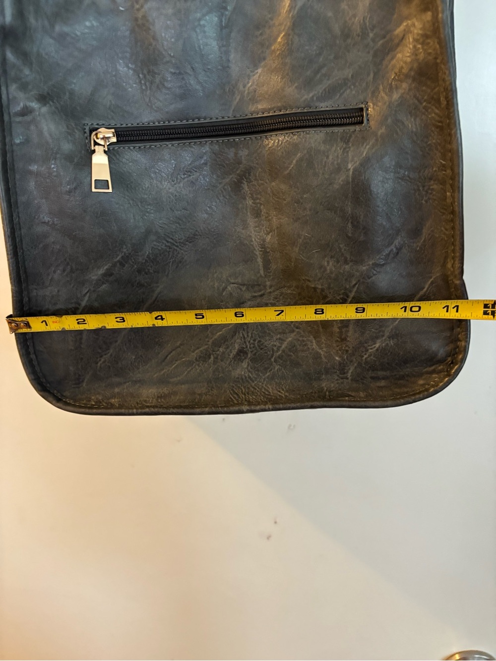 Sleek Black Crossbody Bag with Front Zip Pocket